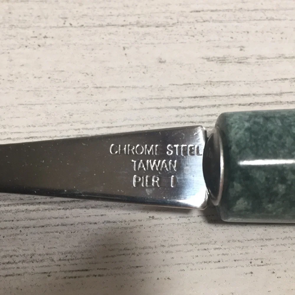 Pier 1 stainless steel cheese knife set with green marble handle.